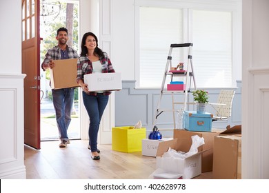 Hispanic Couple Moving Into New Home Together