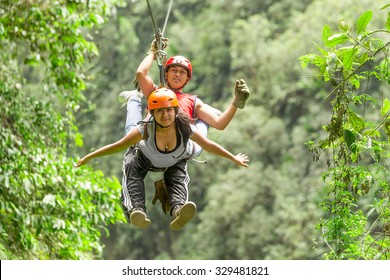 Hispanic Couple Tandem Zip Line