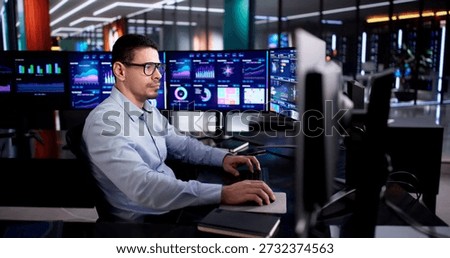 Hispanic Data Analyst Analyzing Business Growth On Desktop Dashboard