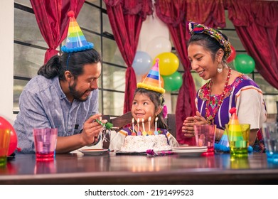 Hispanic Family Celebrates A Birthday. Family At A Birthday Party.
