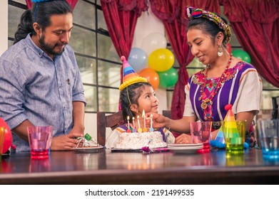 Hispanic Family Celebrates A Birthday. Family At A Birthday Party.
