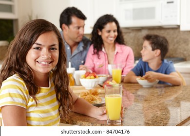 Hispanic Family Eating Breakfast