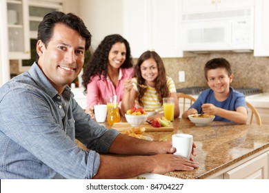 Hispanic Family Eating Breakfast