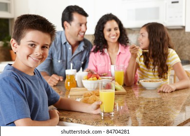 Hispanic Family Eating Breakfast