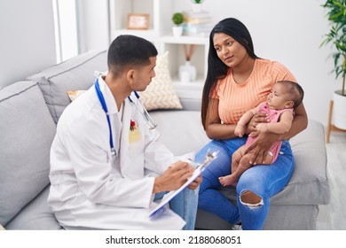 Hispanic Family Having Medic Consultation Writing On Document At Home