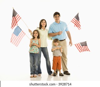 Hispanic Family Holding American Flags.