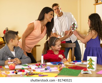 Hispanic Family Making Christmas Cards