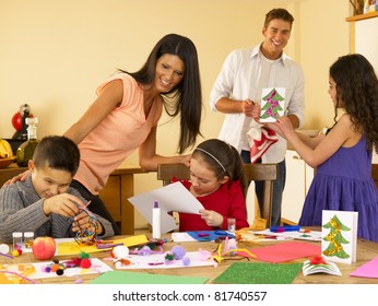 Hispanic Family Making Christmas Cards