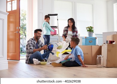 Hispanic Family Moving Into New Home