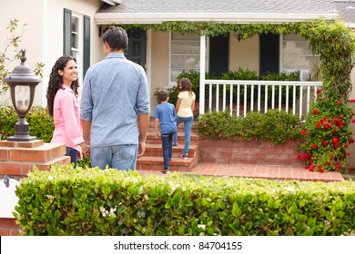 Hispanic Family Outside Home For Rent