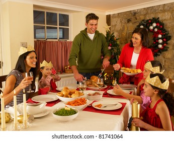 Hispanic Family Serving Christmas Dinner