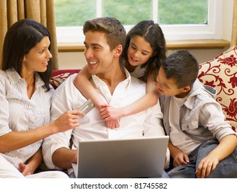 Hispanic Family Shopping Online