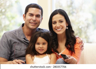 Hispanic Family Watching Television