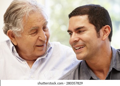 Hispanic Father And Adult Son