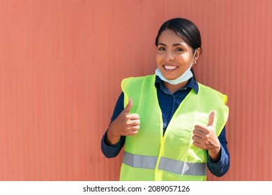 Hispanic Female Construction Worker Wearing A Protective Mask