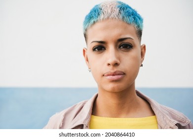 Hispanic Gay Woman Looking At Camera Outdoor - Focus On Face