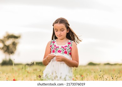 Hispanic Girl Doing A Viral Dance For Social Network Mobile Smartphone Application. Lifestyle