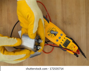 Hispanic Handyman Repairman Conducting Residential HVAC Repair