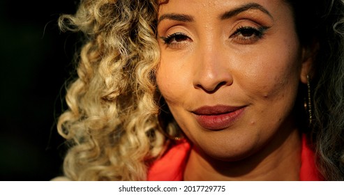 Hispanic Latina Woman Smiling Portrait In Sunlight