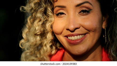 Hispanic Latina Woman Smiling Portrait In Sunlight