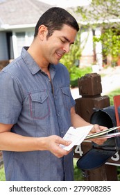 Hispanic Man Checking Mailbox