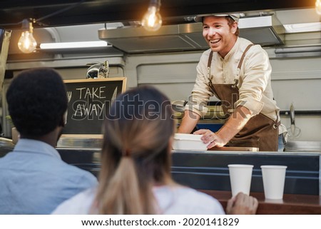 Similar – Mann im Restaurant, der Chips isst.