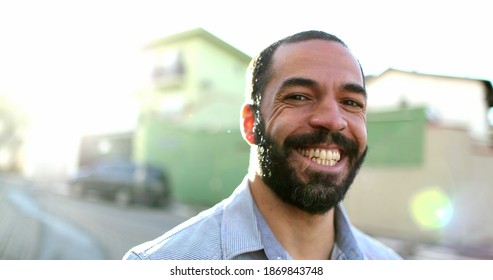 Hispanic Man Smiling At Camera Standing Outside In Street. South American Person Portrait Smile