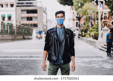 Hispanic Man Wearing Mask Face To Prevent Infection Or Respiratory Illness, Mexican Man With Protection Against Contagious Coronavirus In Mexico Latin America