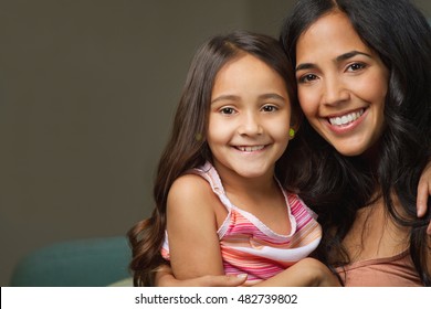 Hispanic Mother And Daughter.