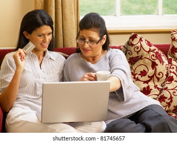 Hispanic Mother And Daughter Shopping Online