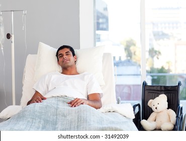 Hispanic Patient Resting In Bed In Hospital