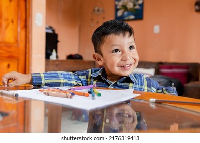 Hispanic Preschool Boy Doing Homework - Little Boy Painting With Crayons - Happy Child At Home