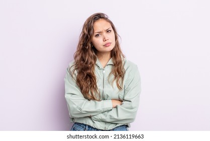 Hispanic Pretty Woman Feeling Displeased And Disappointed, Looking Serious, Annoyed And Angry With Crossed Arms