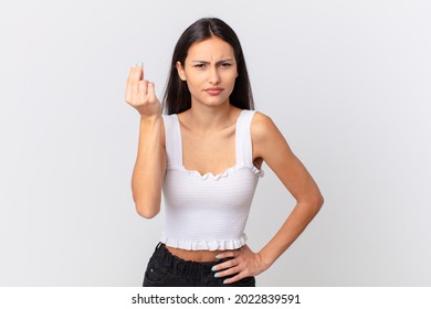 Hispanic Pretty Woman Making Capice Or Money Gesture, Telling You To Pay