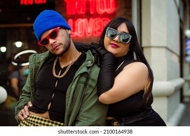 Hispanic queer couple on the street - Powered by Shutterstock