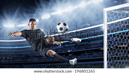 Hispanic Soccer Player kicking the ball