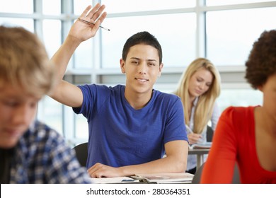 Hispanic Student Asking Question In Class