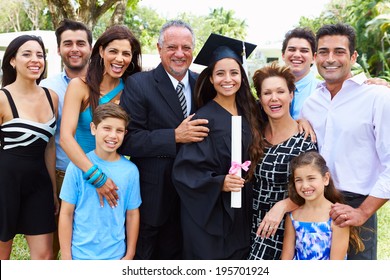 Hispanic Student And Family Celebrating Graduation