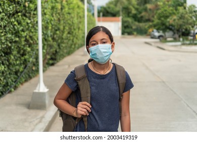 Hispanic Student Getting Ready For School, Girl With Protective Mask Leaving The House