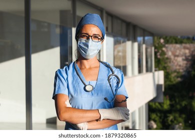 Hispanic Woman Doctor With Facemask In A Hospital In Latin America