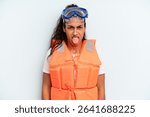 hispanic woman feeling disgusted and irritated and tongue out. life jacket and summer concept