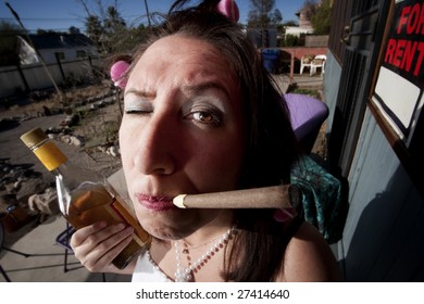 Hispanic Woman In Front Of House With Messy Yard