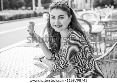 Similar – Young woman with closed eyes laughing over nature background