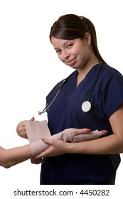 Hispanic Woman Healthcare Worker Wearing Dark Blue Scrubs Wrapping An Arm With A Tensor Bandage Wearing A Stethoscope On White