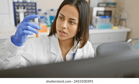 Hispanic woman scientist analyzing a sample in a laboratory setting, wearing a lab coat and gloves. - Powered by Shutterstock