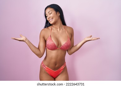 Hispanic Woman Wearing Bikini Smiling Showing Both Hands Open Palms, Presenting And Advertising Comparison And Balance 