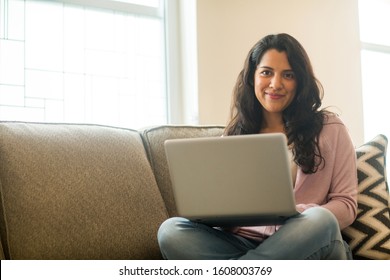 Hispanic Woman Working On The Computer