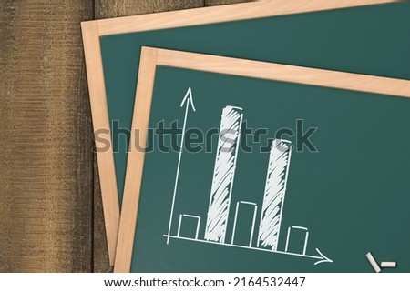 histogram with distribution - rough representation with white chalk on blackboard, mathematics and statistics concept