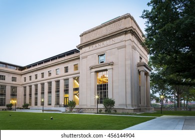The historic architecture of the Massachusetts Institute of Technology in Cambridge, Massachusetts, USA at night.