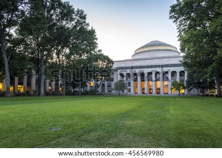 The historic architecture of the Massachusetts Institute of Technology in Cambridge, Massachusetts, USA at sunset.